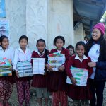 Distributing Stationery to School Children